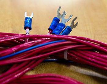 A close up of wire harness connectors
